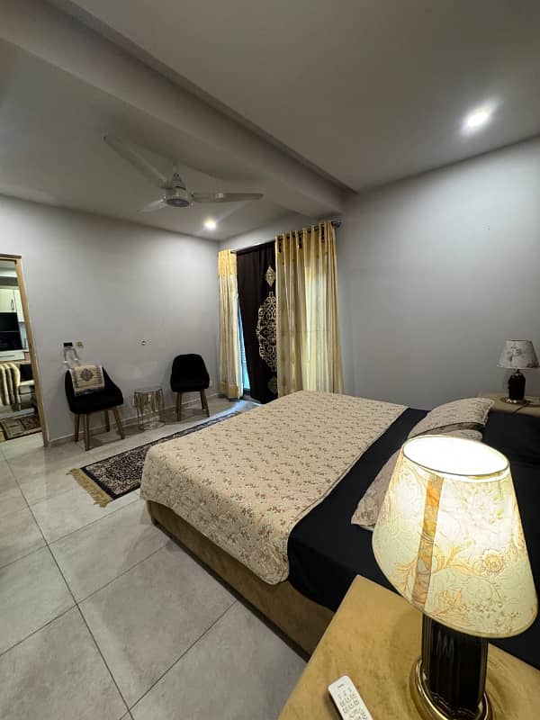 E11 One master bedroom fully furnished apartment available for rent 3