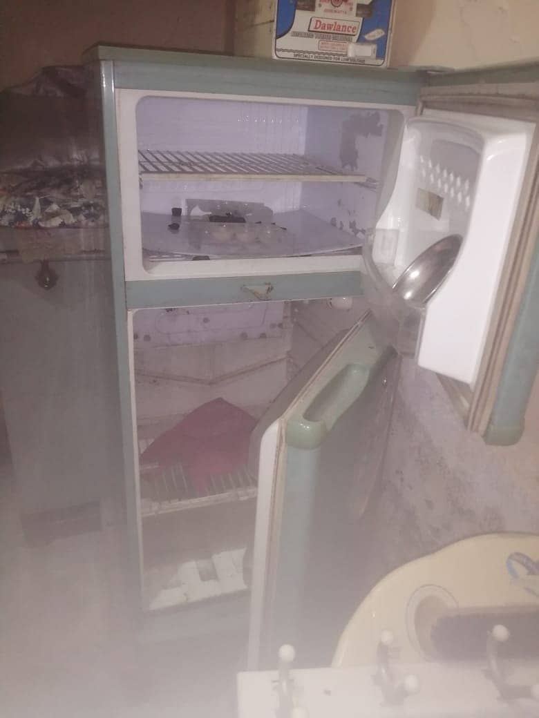 Fridge is used but it's in a good condition 4