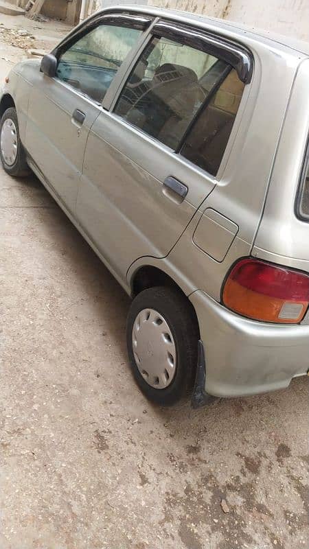 Daihatsu Cuore 2010 bt mehran cultus alto 2