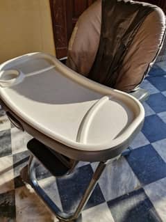 baby highchair branded in good condition