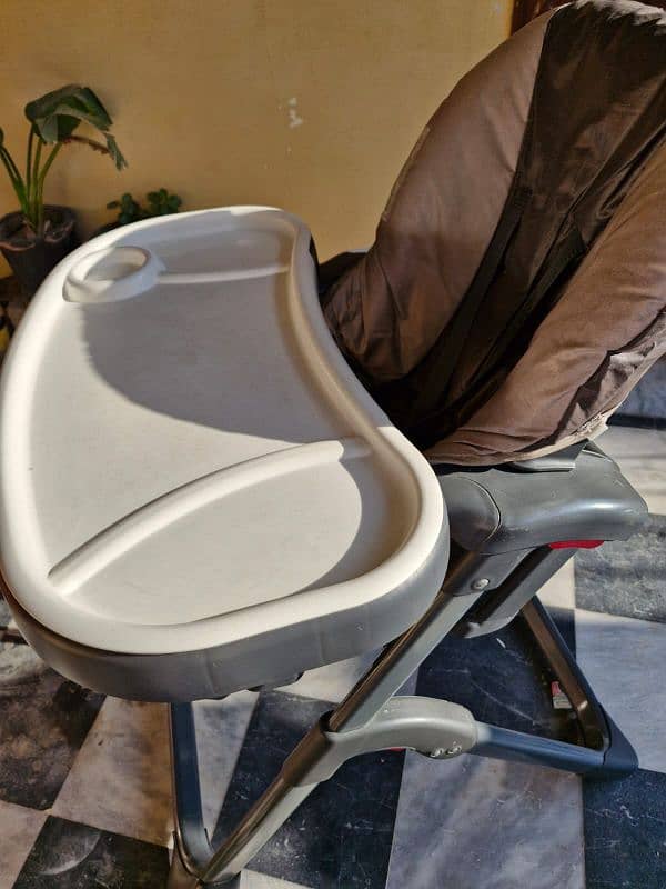 baby highchair branded in good condition 1