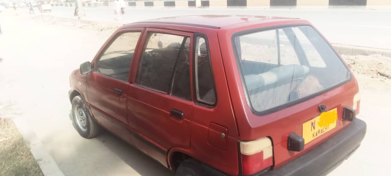 Suzuki Mehran VX 1990 model red colour. good condition. only petrol 10