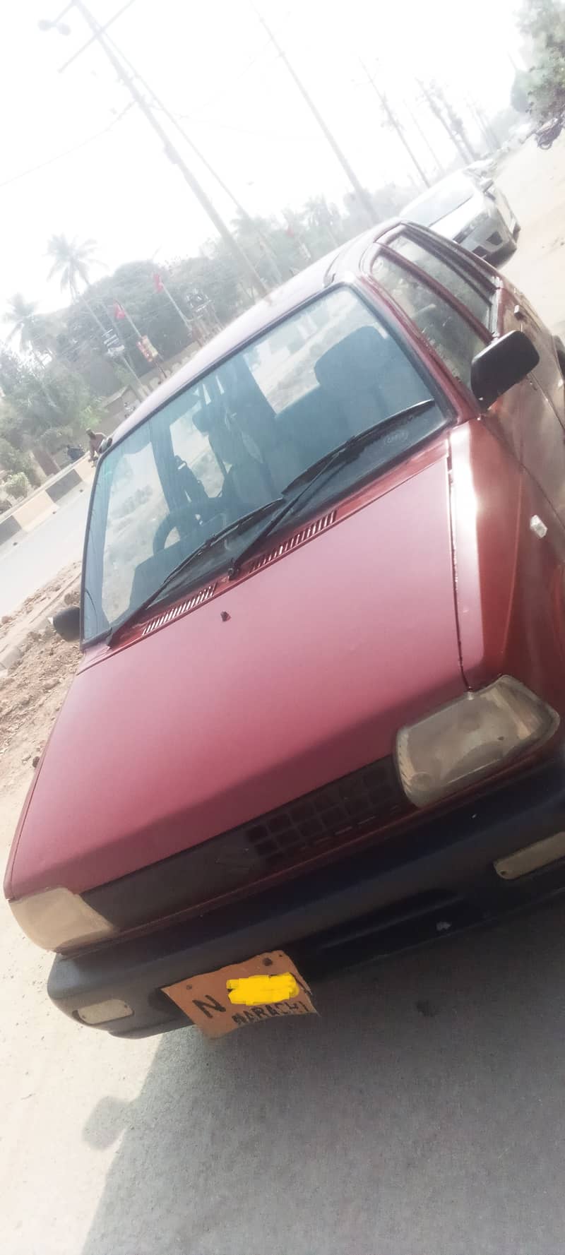 Suzuki Mehran VX 1990 model red colour. good condition. only petrol 12