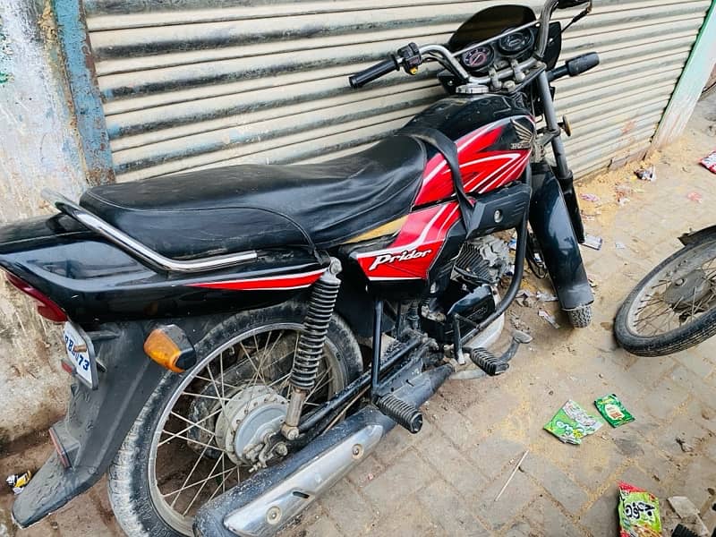 honda 100 black first owner 2