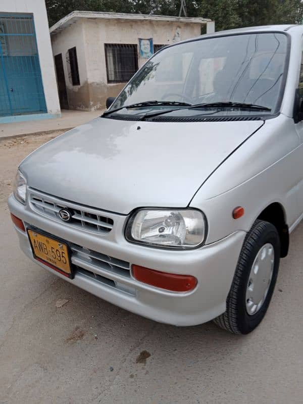 Daihatsu Cuore 2011 original auto 6