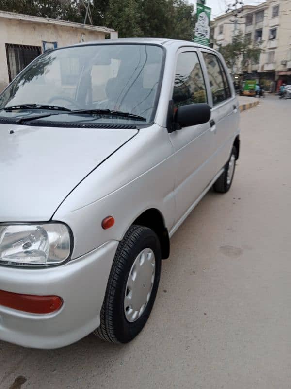 Daihatsu Cuore 2011 original auto 9