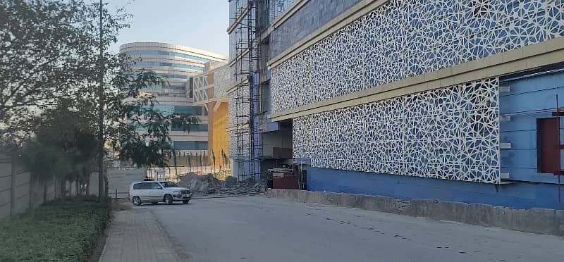 4 Marla Commercial Next to Giga Mall, D Mall, Marriott Hotel Off GT Road. Lower Ground+Ground+5 Total 7 floors approval. CDA Islamabad. DHA Transfer. Dem 5.75 Crore Negotiable 0