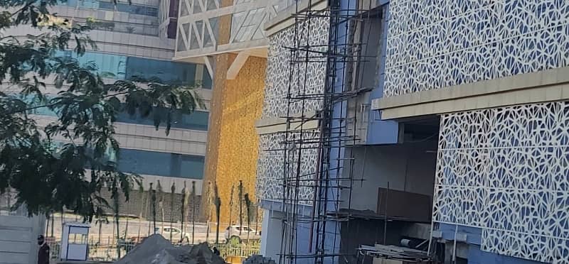 4 Marla Commercial Next to Giga Mall, D Mall, Marriott Hotel Off GT Road. Lower Ground+Ground+5 Total 7 floors approval. CDA Islamabad. DHA Transfer. Dem 5.75 Crore Negotiable 1