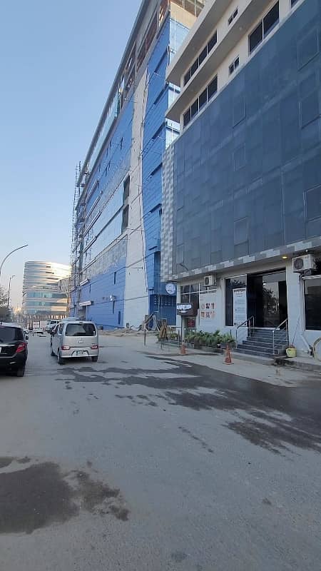 4 Marla Commercial Next to Giga Mall, D Mall, Marriott Hotel Off GT Road. Lower Ground+Ground+5 Total 7 floors approval. CDA Islamabad. DHA Transfer. Dem 5.75 Crore Negotiable 9