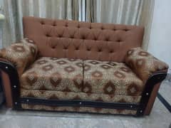 2 seater brown sofa