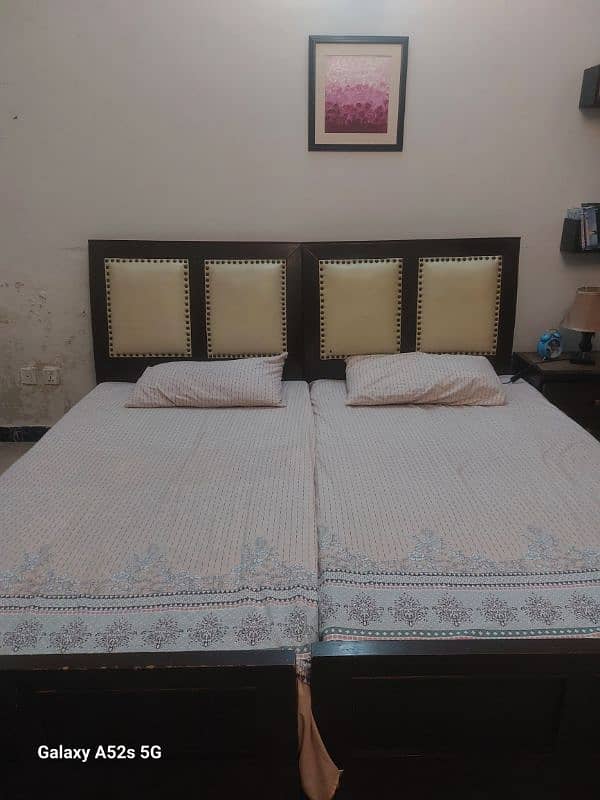 Two single beds with a side table (without mattress) 3