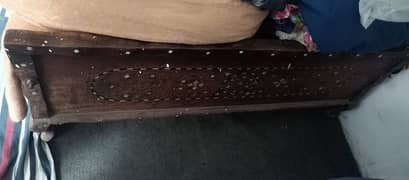 wooden single bed