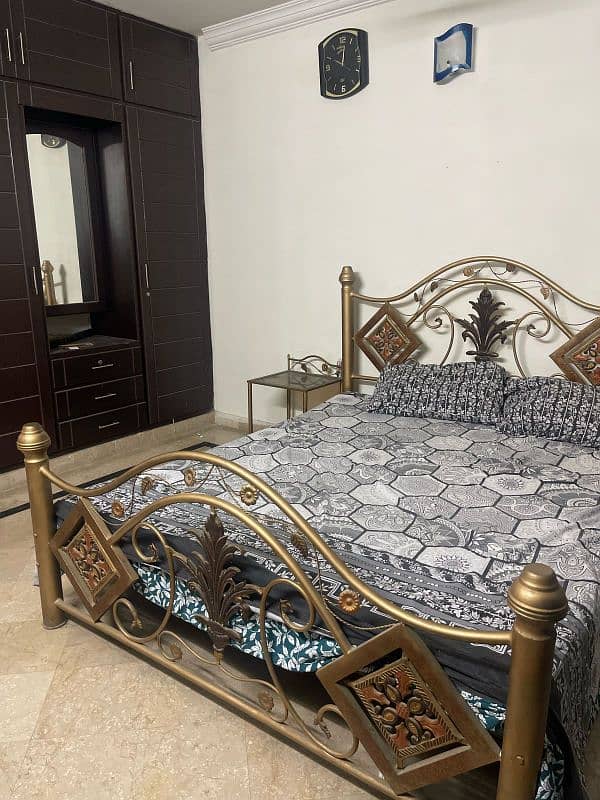 Double iron bed for sale with two side tables 0