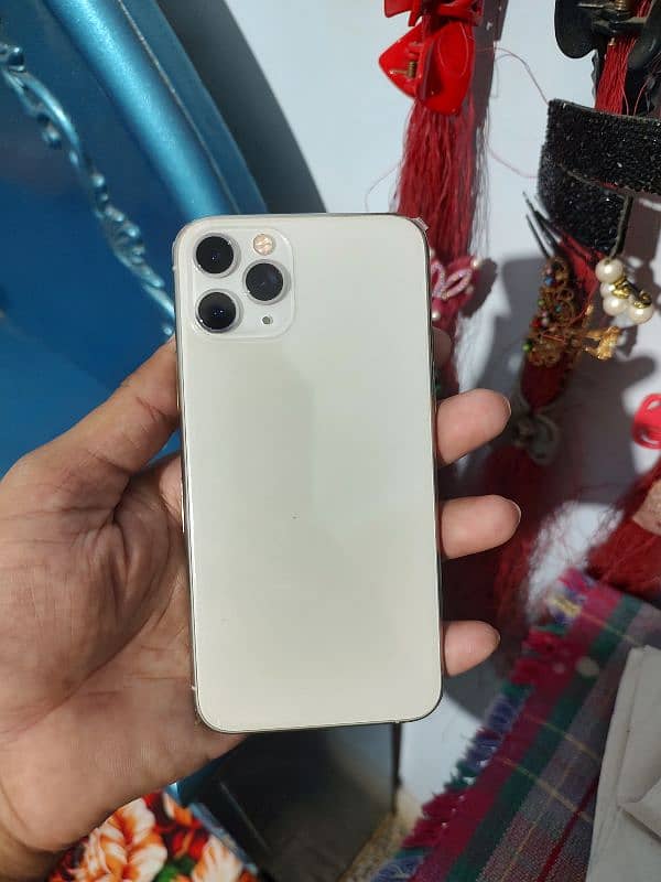 I phone 11 pro Jv064gb battery 73 health only one line side water pack 17