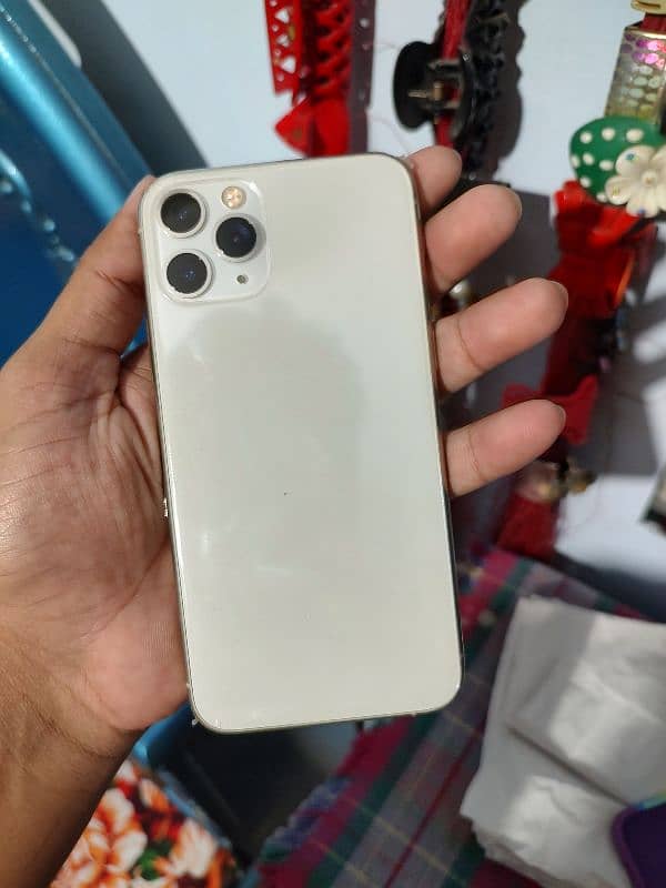 I phone 11 pro Jv064gb battery 73 health only one line side water pack 18