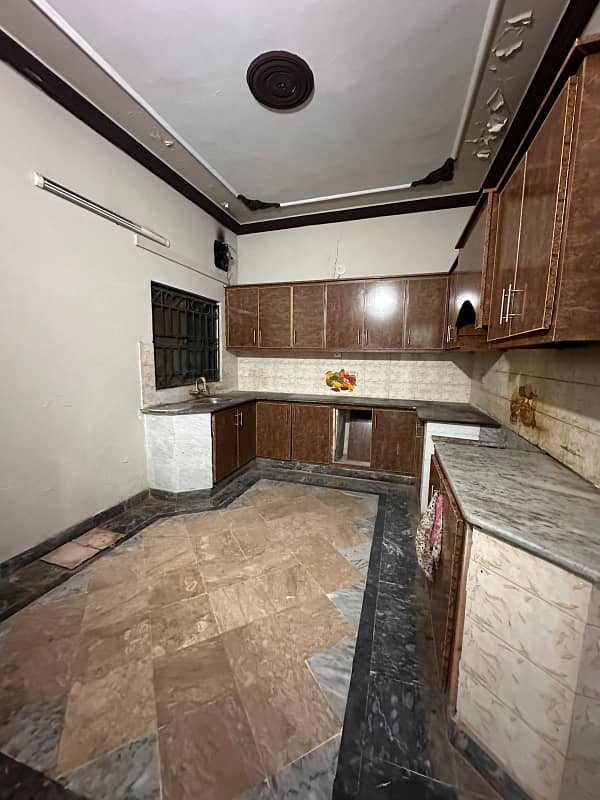 Portion for rent on vip location ayub colony 2bed tv lounge drawing room dayining room 3bath kichan bijli gas sab available 2