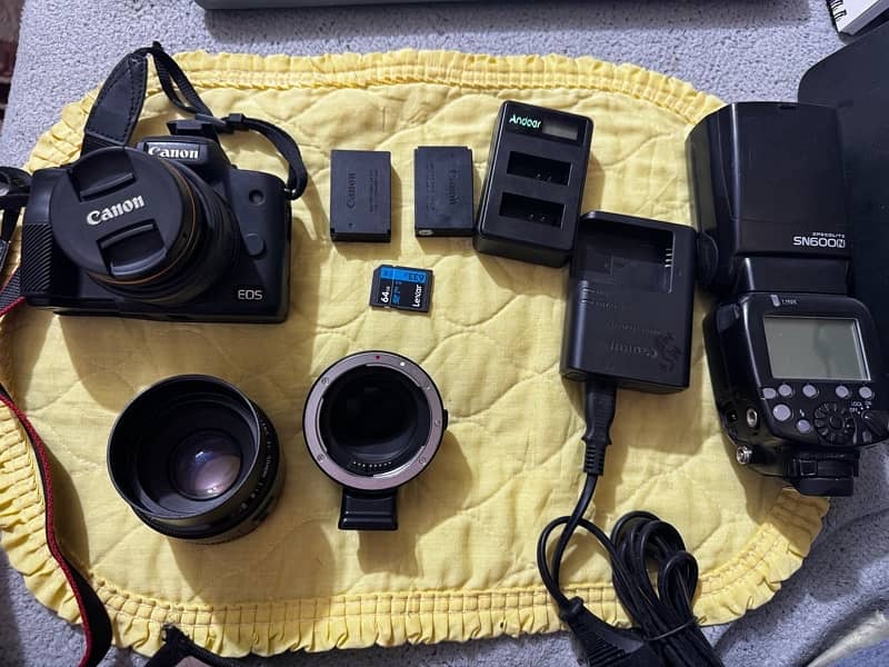 canon M50 mark ii mirrorless with 2 lens flash gun 4