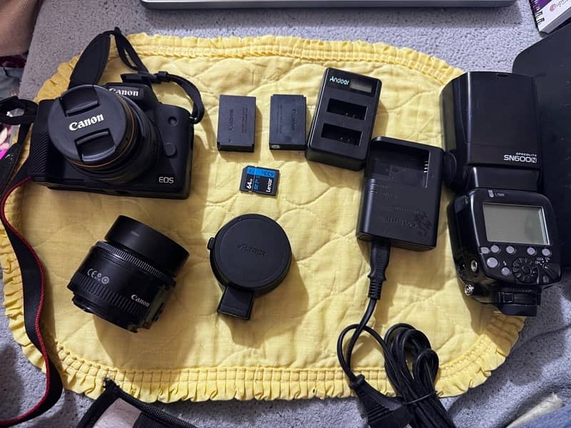 canon M50 mark ii mirrorless with 2 lens flash gun 5