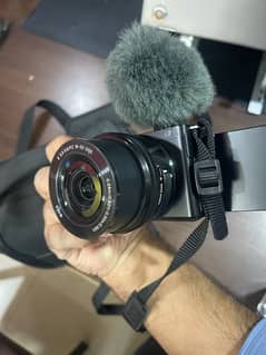 Sony zv e10 with Sony mic and wireless shooting grip tripod