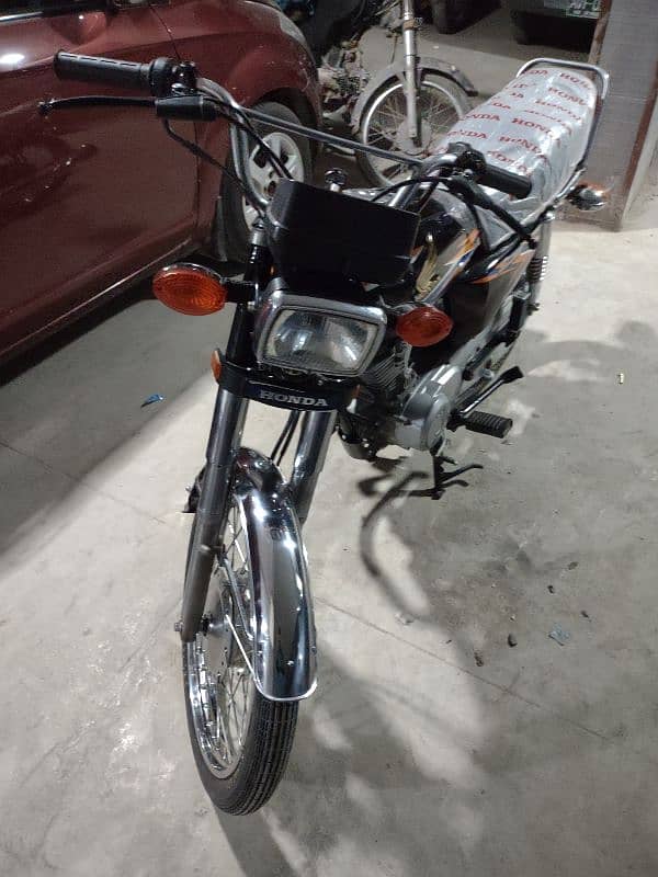 honda 125 model 2018 karachi num 1st owner complete file 1