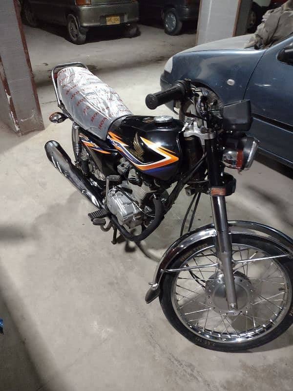 honda 125 model 2018 karachi num 1st owner complete file 3