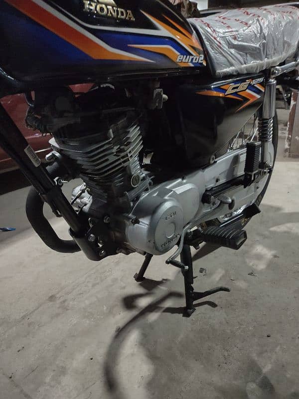 honda 125 model 2018 karachi num 1st owner complete file 11