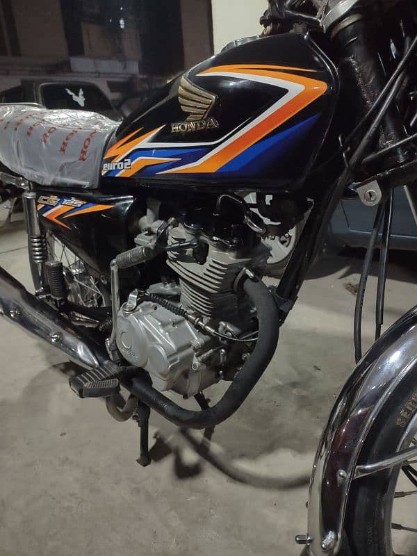 honda 125 model 2018 karachi num 1st owner complete file 14