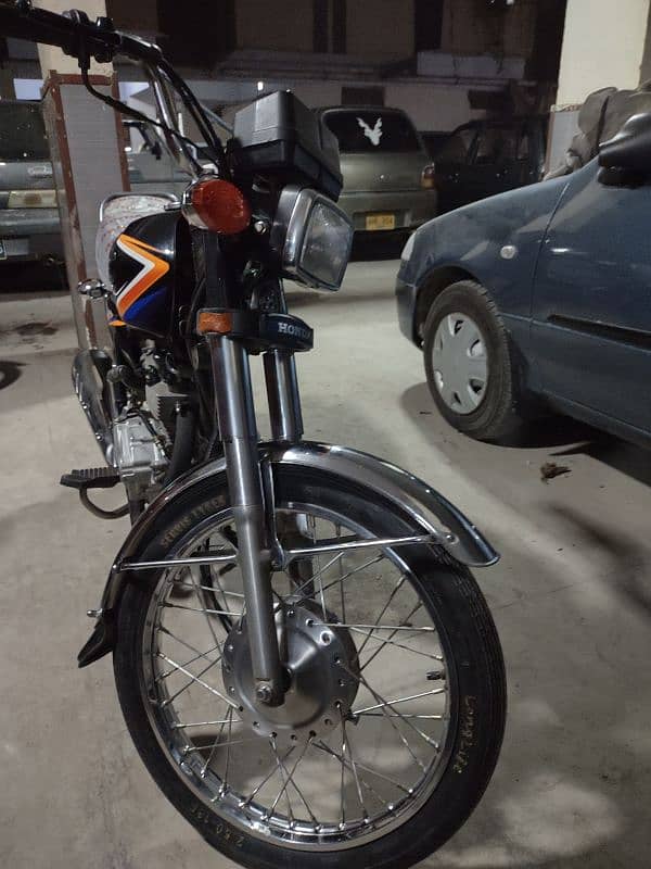 honda 125 model 2018 karachi num 1st owner complete file 15