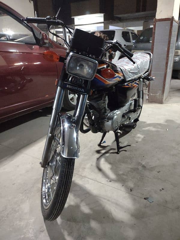 honda 125 model 2018 karachi num 1st owner complete file 16