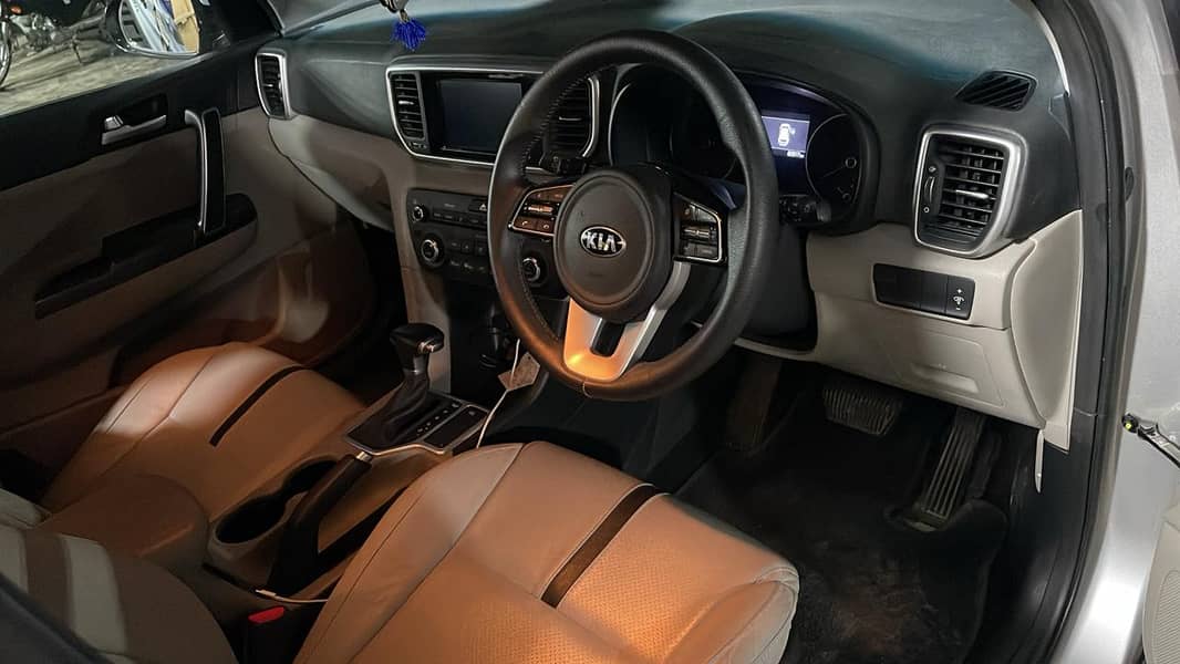 Hassle-Free Transportation – Kia Sportage SUV with Driver Available! 7