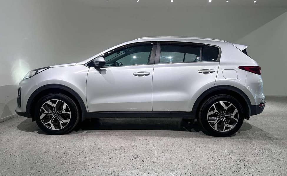 Hassle-Free Transportation – Kia Sportage SUV with Driver Available! 2