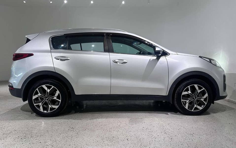 Hassle-Free Transportation – Kia Sportage SUV with Driver Available! 3