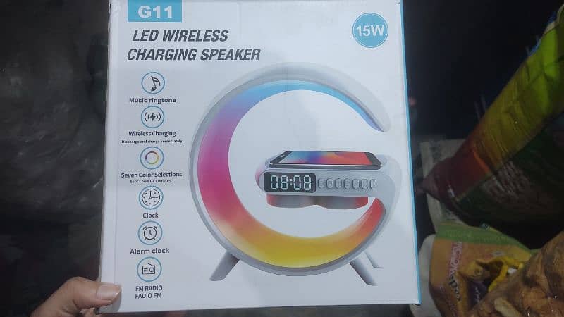 WIRELESS CHARGING AND BLUETOOTH SPEAKER 0