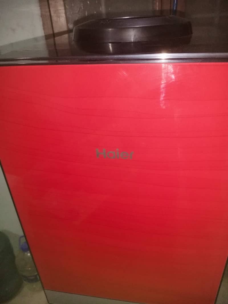 Haier water dispenser ,glass door, one time used. 3