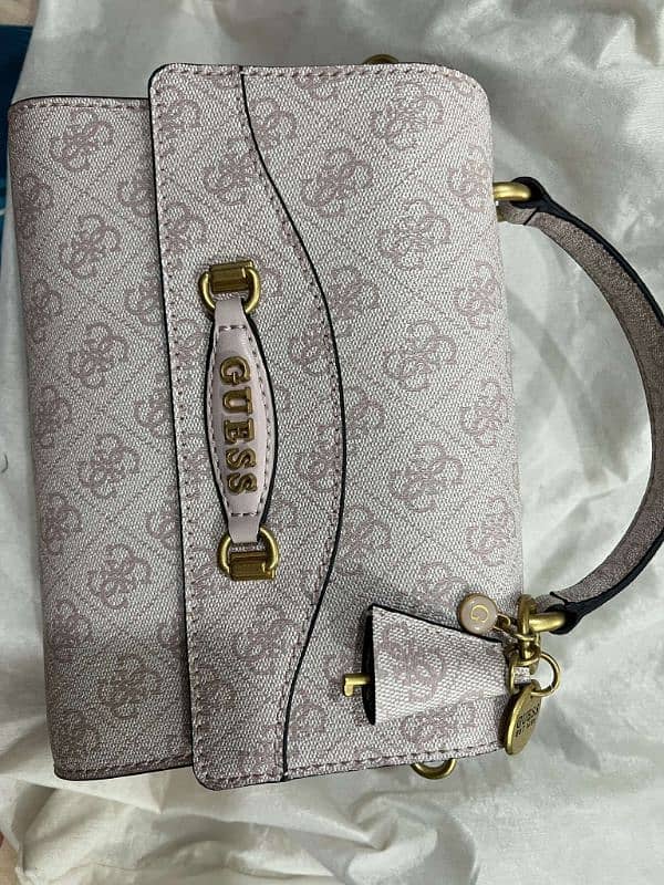 "Guess" branded luxurious cross body bag 1