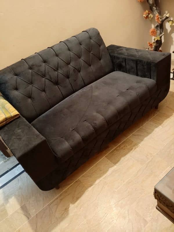 I am selling a sofas and Big size table at very low price 4