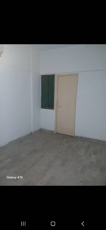 Flat for Rent. Main Road Building, Johar-Mor karachi 1