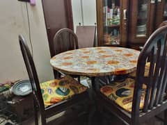 Round dining table with chairs