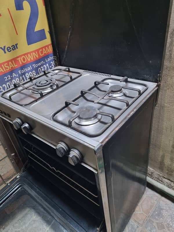 electric & gas oven (2 months used) 0