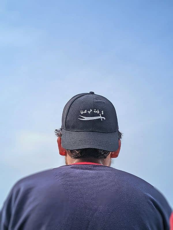 "لا راحة في الدنيا" Stylish Black Cap with Sword Embroidery 4