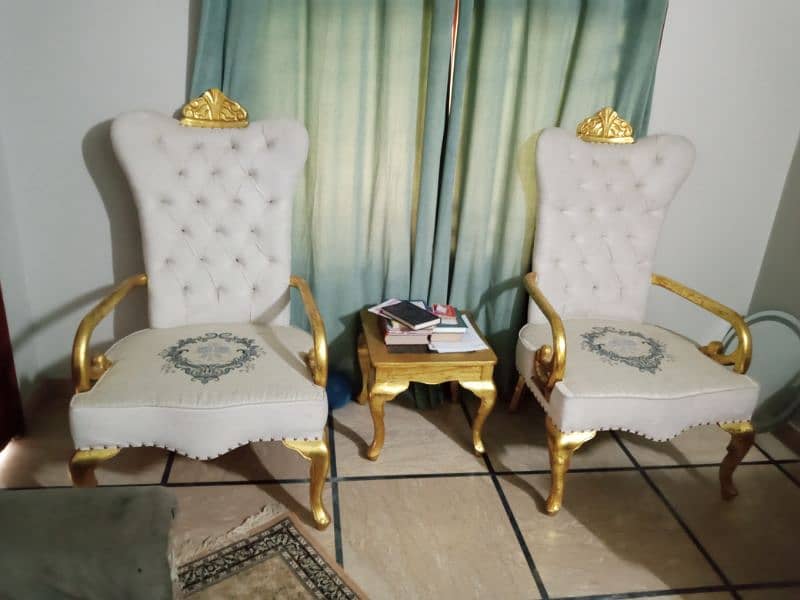 stylish  2 chairs with table. . . 1