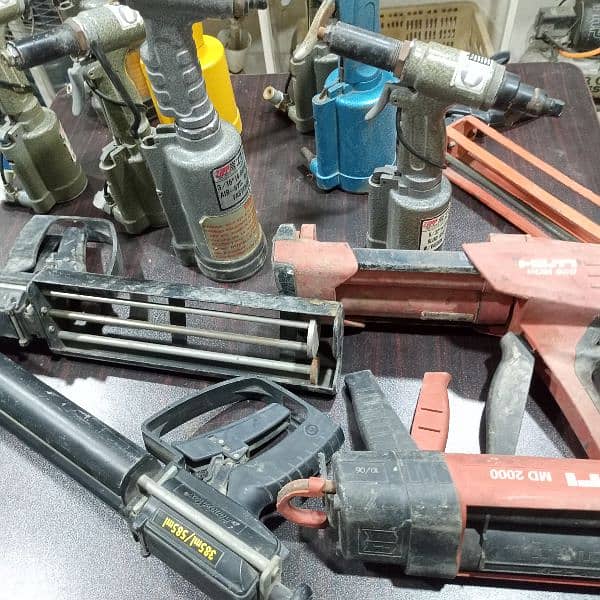 pneumatic pop riveter and concrete epoxy applicator 2