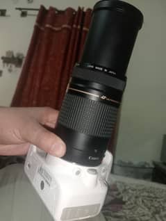 75/300 mm lens and cannon kiss x7 for sale