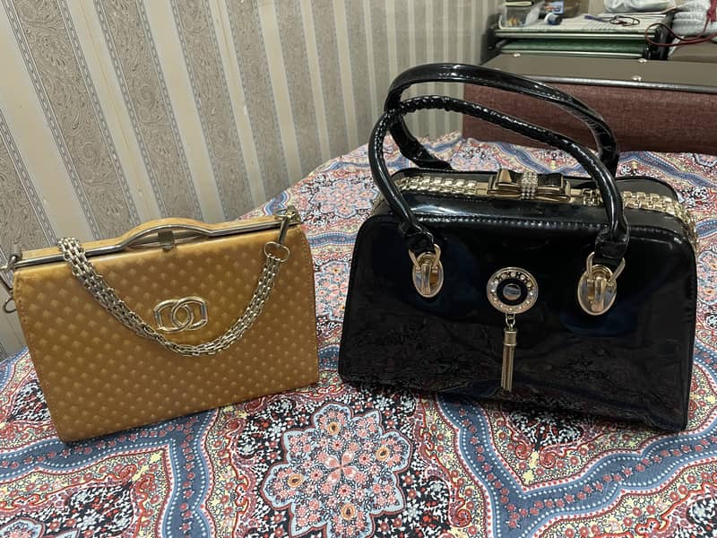 Pair of ladies handbags for sale 0