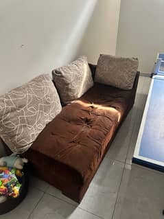 5 seater used L shaped sofa with big cushions