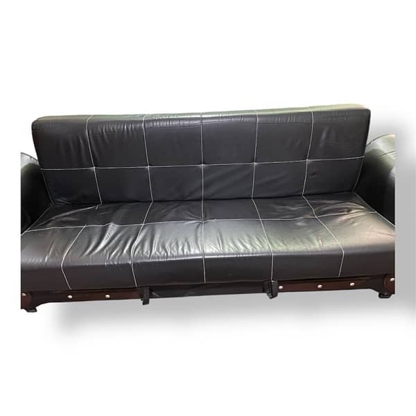 black faux leather futon sofa bed. 0