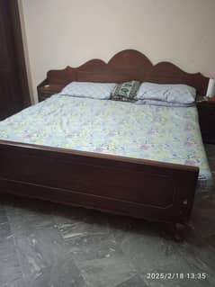 double bed with side table