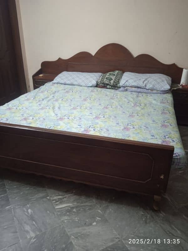 double bed with side table 0