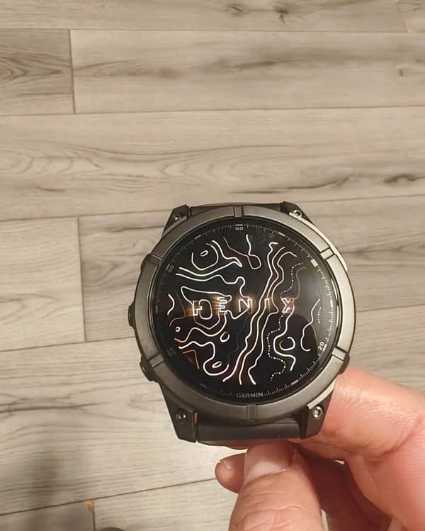 Fenix E AMOLED stainless steel with a black silicone band 1