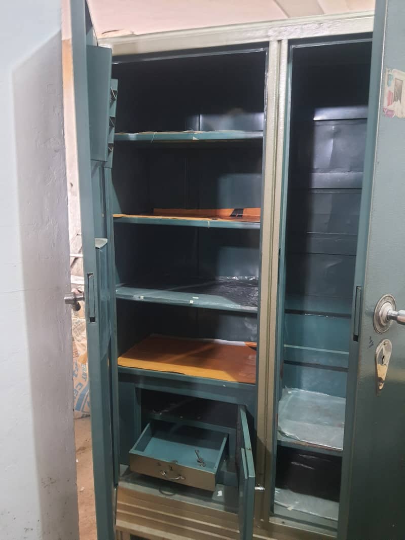 Iron cupboard. . . 6 and half feet height. 5 feet width 9